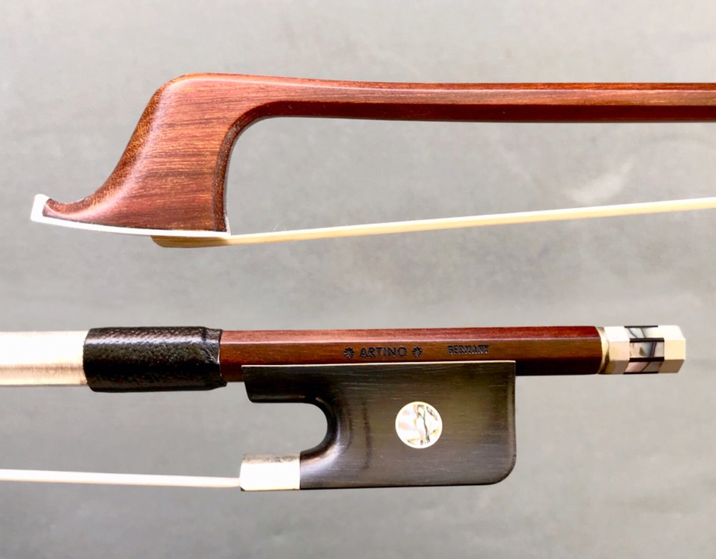 *ARTINO* GERMANY silver Pernambuco cello bow, octagonal, with Paris eyes & fancy button
