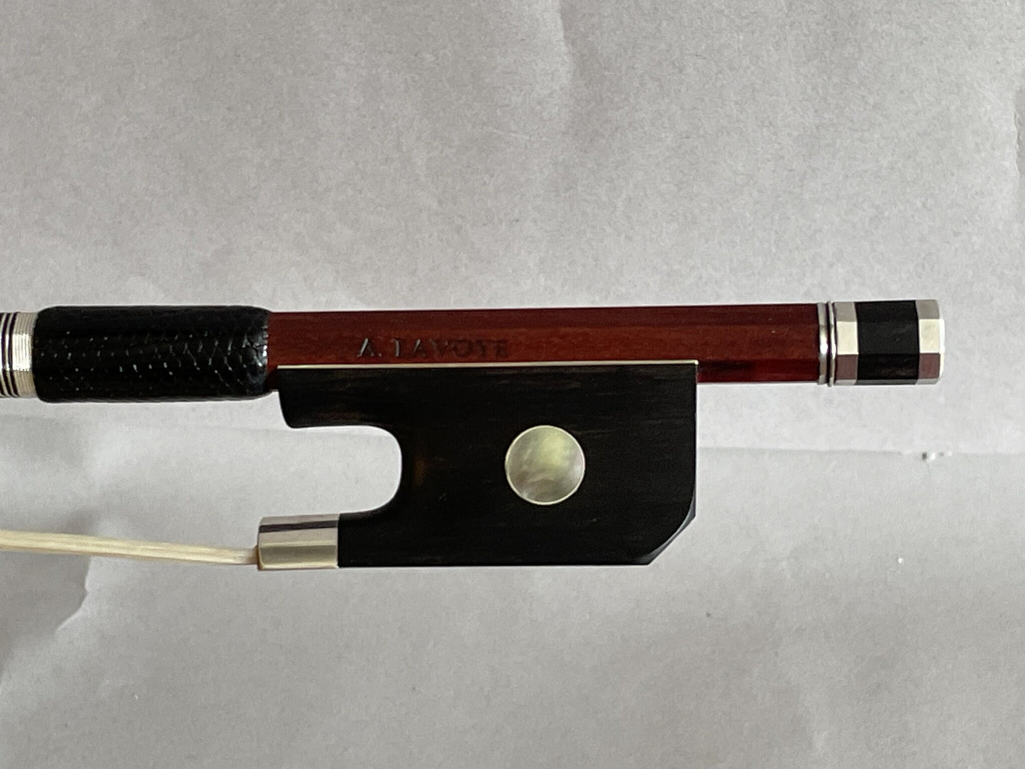 Andre LAVOYE cello bow, round Pernambuco stick, ebony & silver mounted with angled heel, Montreal, Quebec, 80.6g