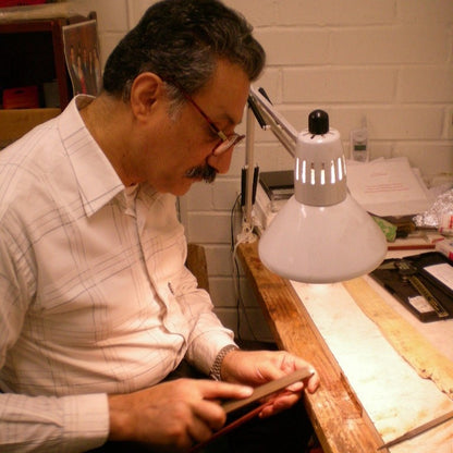 SH. TUMARI silver/ebony violin bow, light Pernambuco, 63.5 grams, by Shahrokh Tumari, Los Angeles, USA