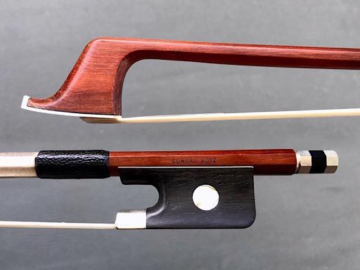 Conrad Götz cello bow, with nickel-mounted ebony frog