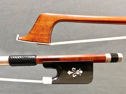 Arcos Brasil cello bow: horn & silver frog, with pearl fleur-de-lis inlay.