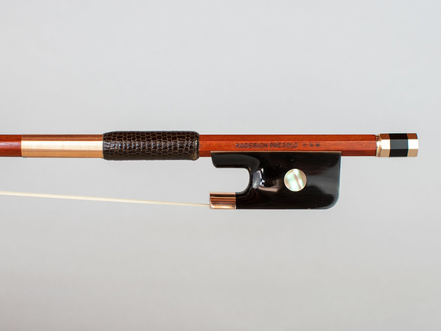 RODERICH PAESOLD ***  master cello bow, gold-mounted, with buffalo horn frog, 80.7 g. 2022, GERMANY